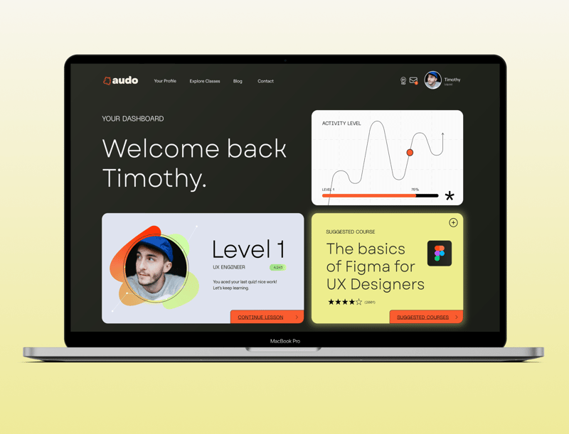 laptop displaying Audo dashboard on the screen with a user profile, activity level, and a suggested course.