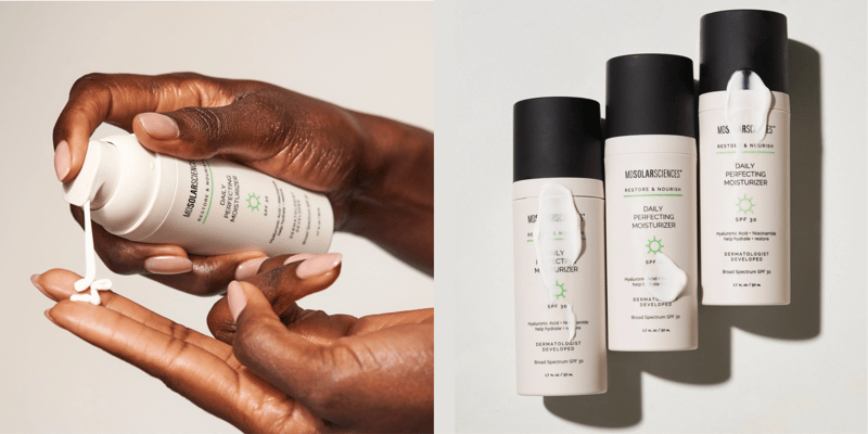 Womans hand pumping white cream from MD Solar Sciences Daily Protecting Moisturizer into her hand.